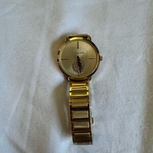 Michael Kors, gold watch, never worn, plastic intact, NWOT
